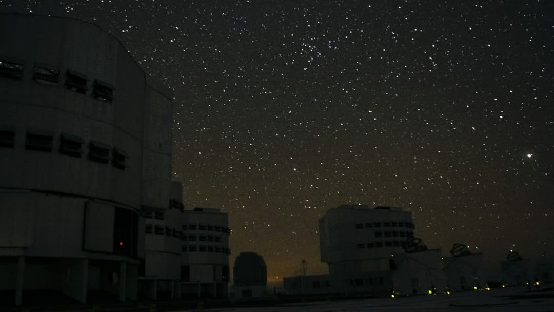 Nighttime view of the European Southern Observatory Very Large Telescope domes under the Milky Way