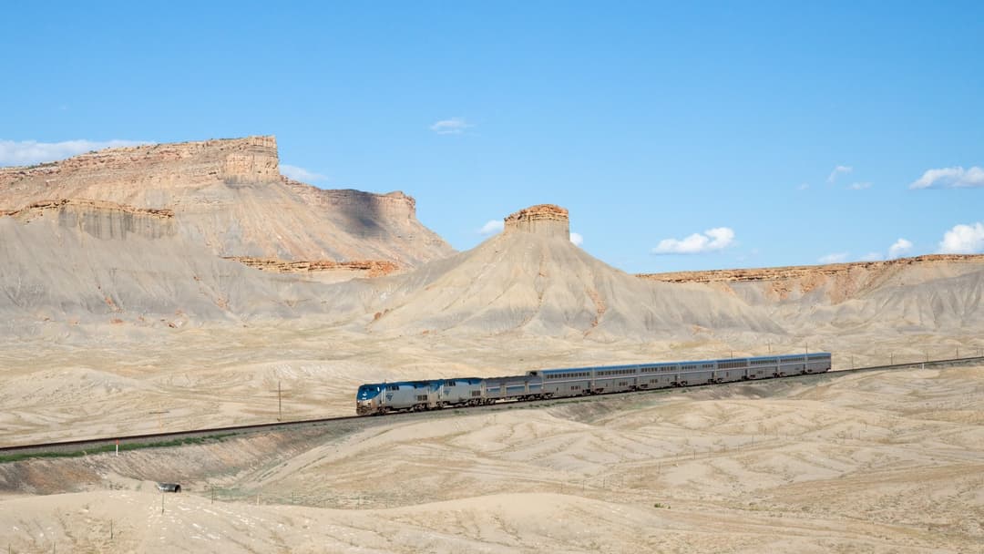 Amtrak's California Zephyr traveling beneath the Book Cliffs between Green River and Floy, Utah.