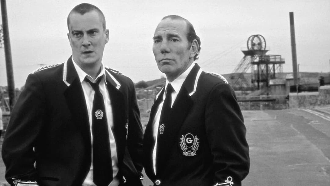 Pete Postlethwaite leading the Grimley Colliery Brass Band in a scene from Brassed Off