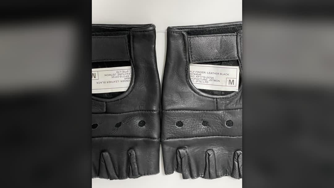 Black leather gloves designed for cold winter weather