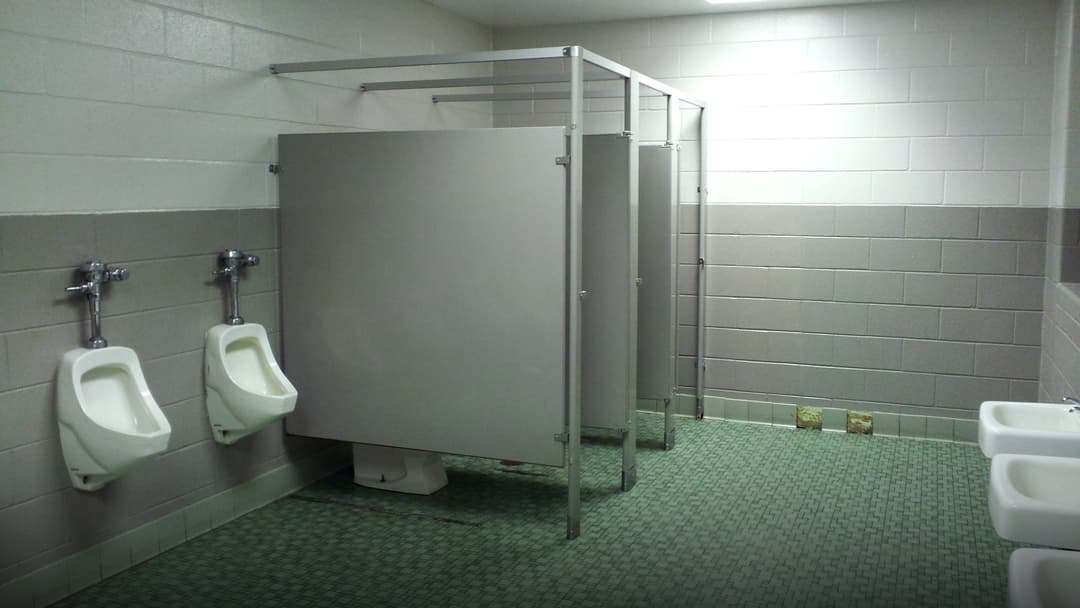 Standard American commercial public restroom stall doors.