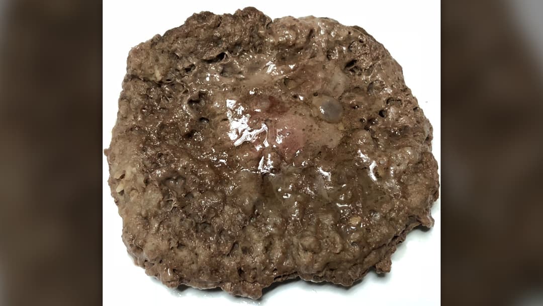 Cooked lean ground beef on a plate