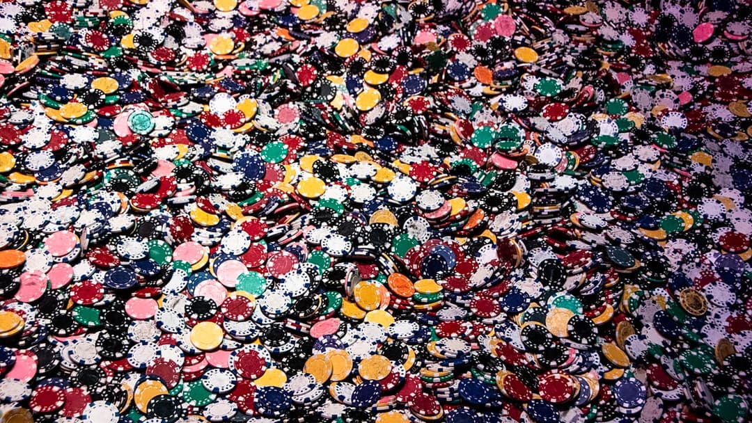 Green felt poker table set up for championship tournament play
