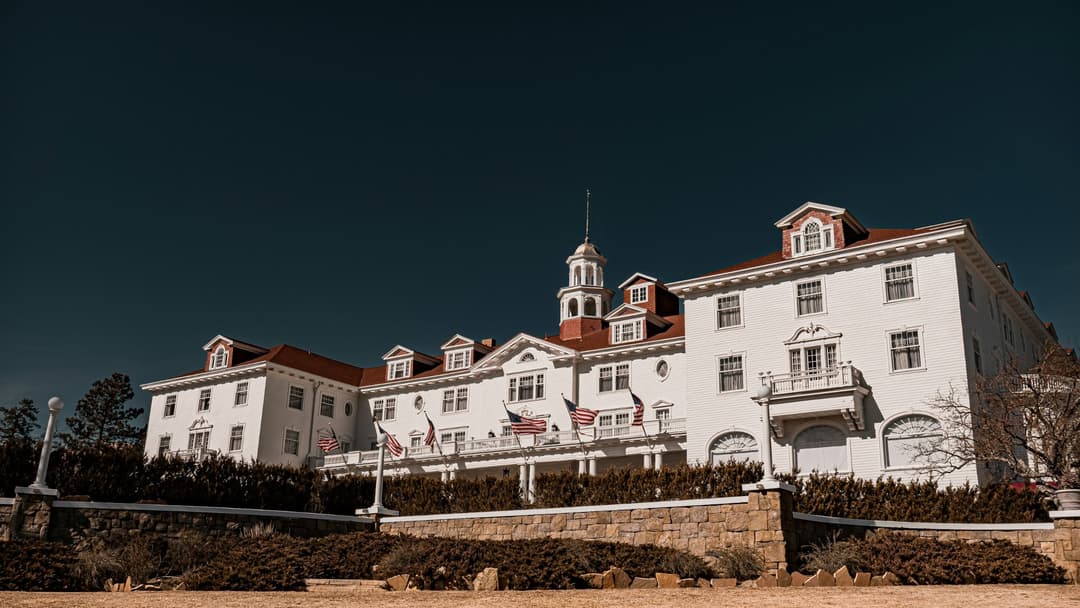 The Stanley Hotel illuminated at night in Estes Park, Colorado