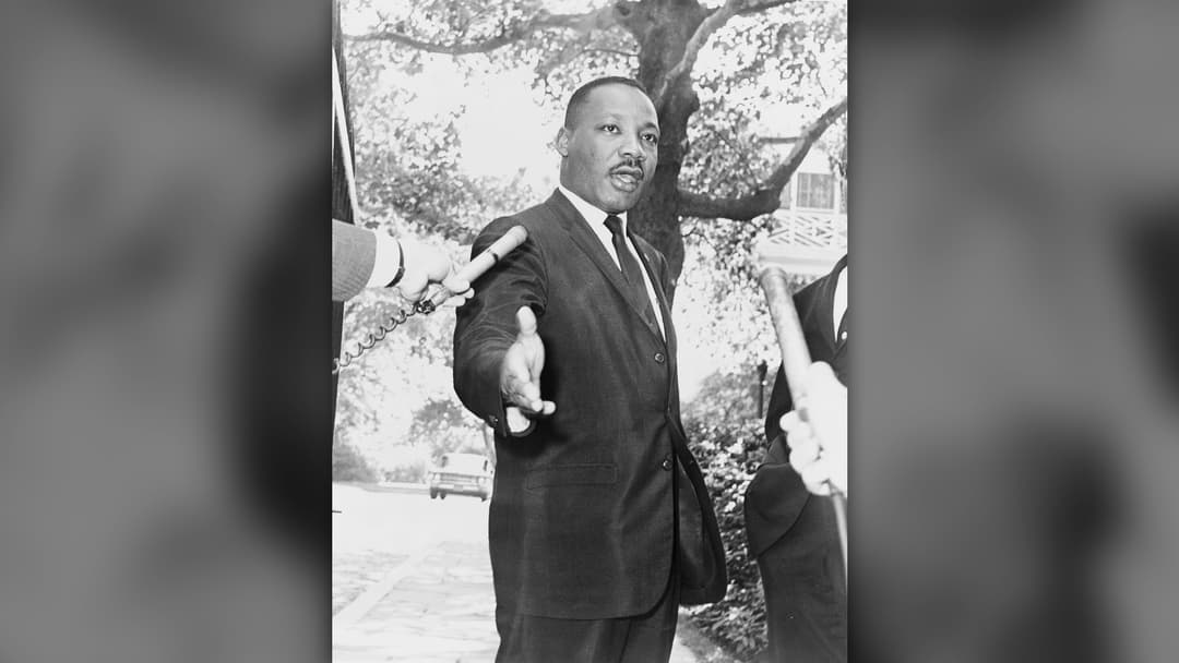 Dr. Martin Luther King Jr. in a 1964 press conference portrait