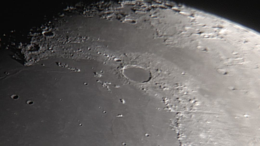 Detailed wide telescopic view of Plato Crater and rugged impact basins on the Moon