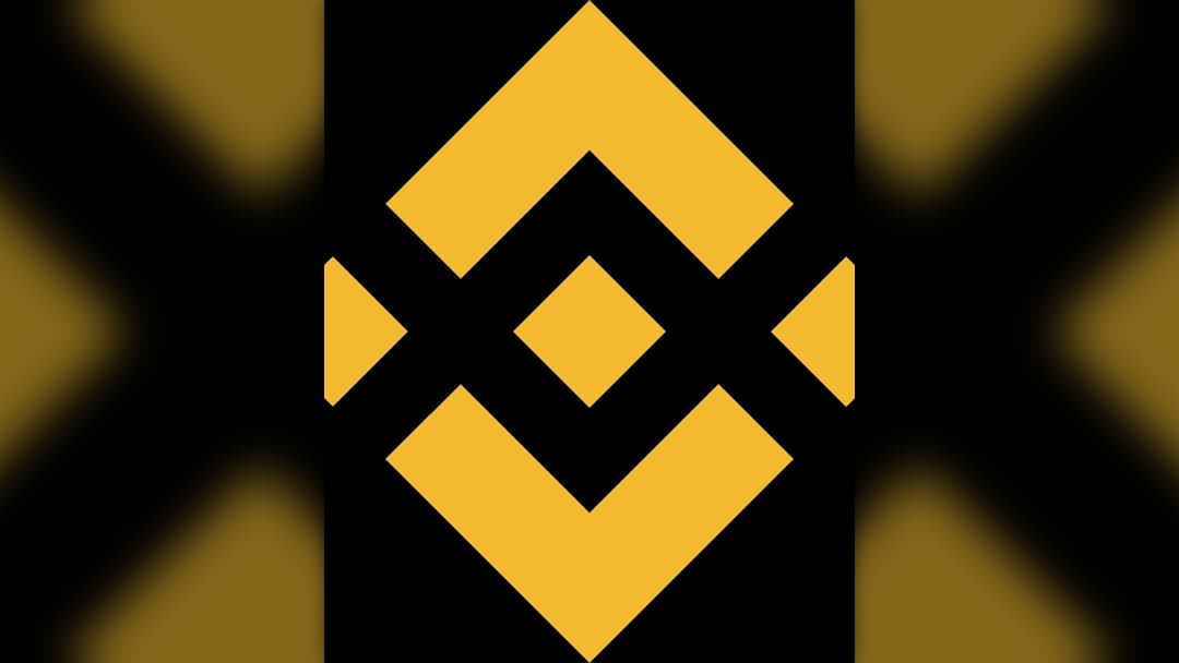 Official Binance corporate gold geometric logo on dark background