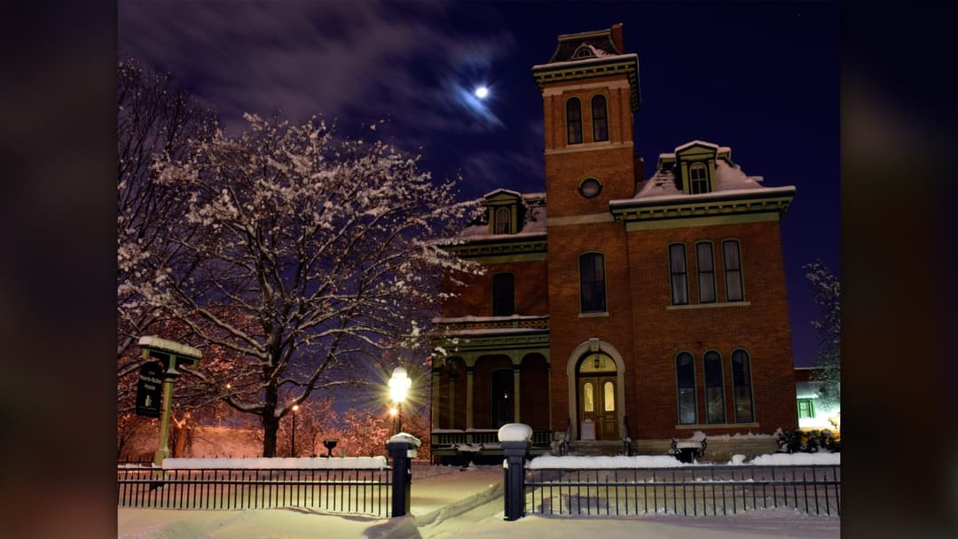 Snow-covered historic house in Indianapolis, Indiana in winter