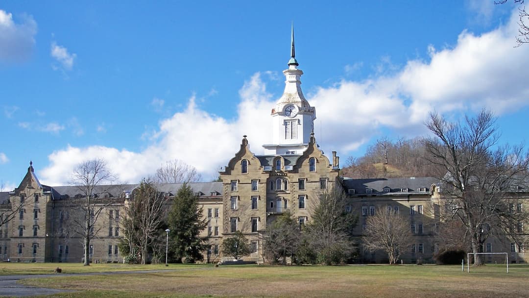 Panoramic facade of the Trans-Allegheny Lunatic Asylum in Weston, West Virginia