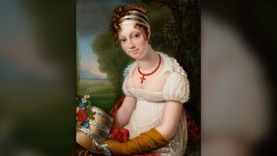 Nineteenth century portrait of a woman wearing an intricate straw woven bonnet