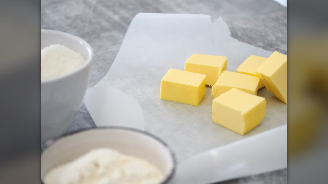 Opened tub of margarine spread
