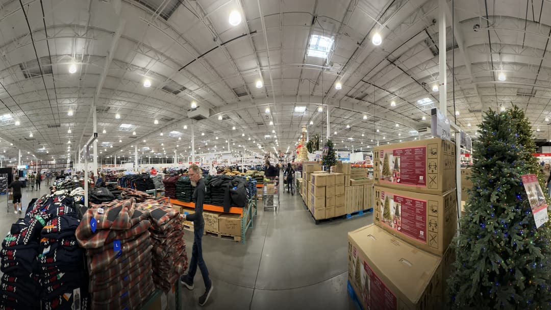 Panorama of a massive Costco Wholesale store.