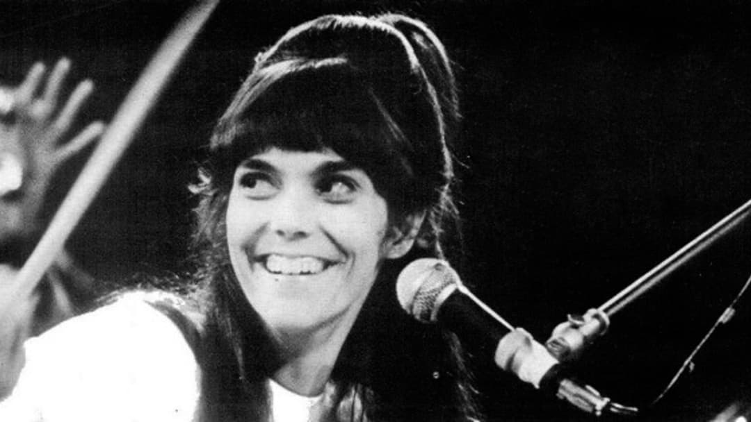 Karen Carpenter seated at drum kit