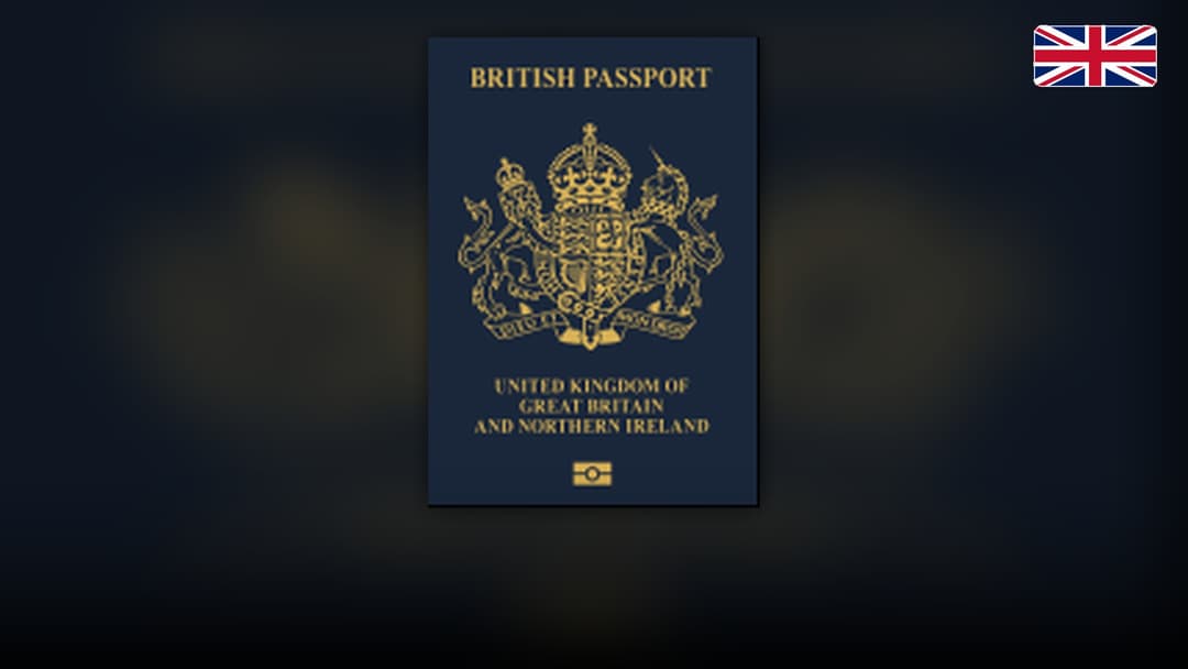 Navy blue British biometric passport booklet displaying the Royal Coat of Arms.