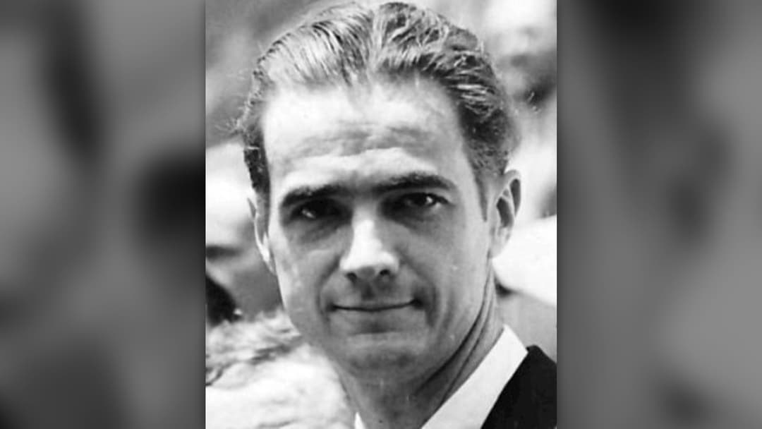 Archival portrait of record-setting American aviator and industrialist Howard Hughes in 1938