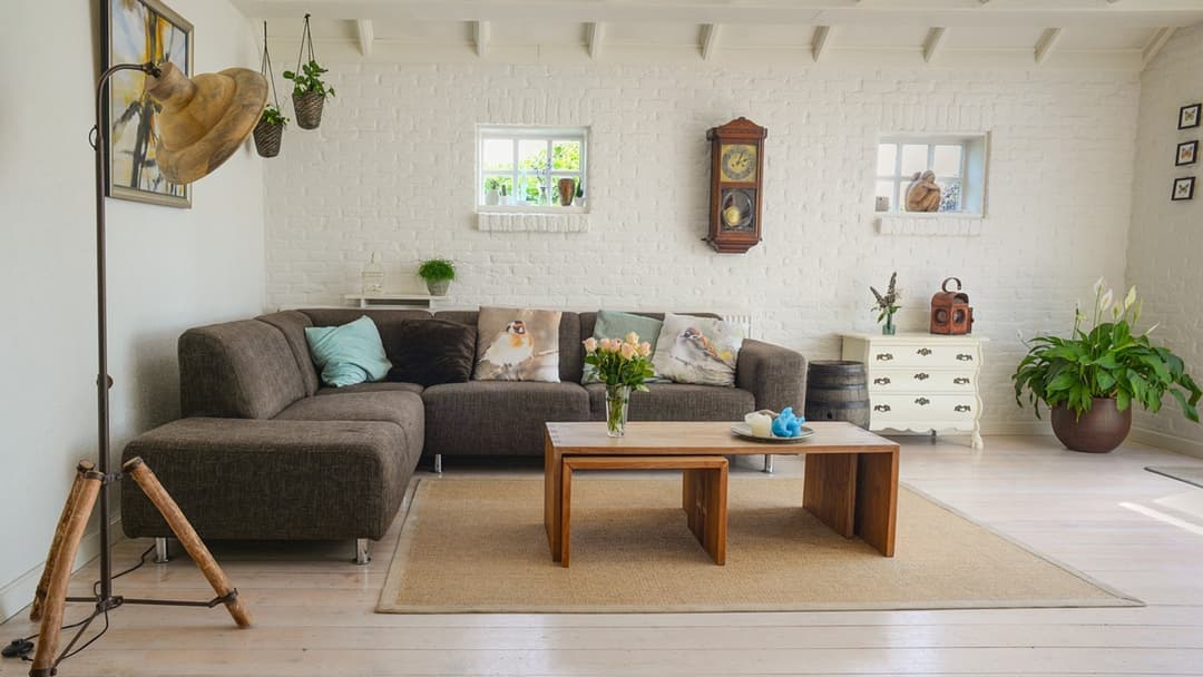 Heavy living room sofa and furniture resting on a floor