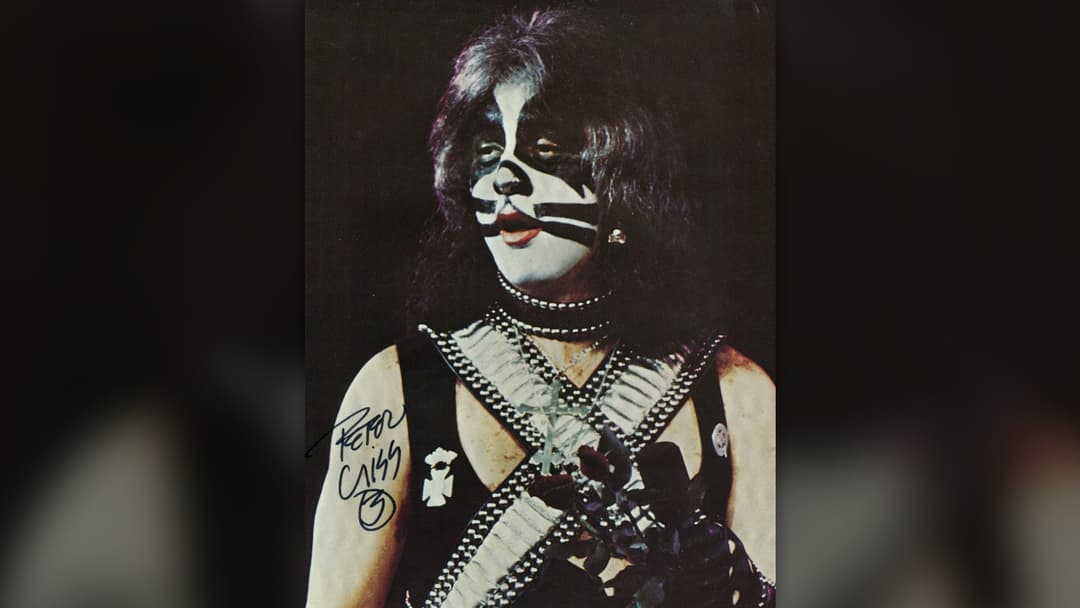 Peter Criss behind Kiss drum kit