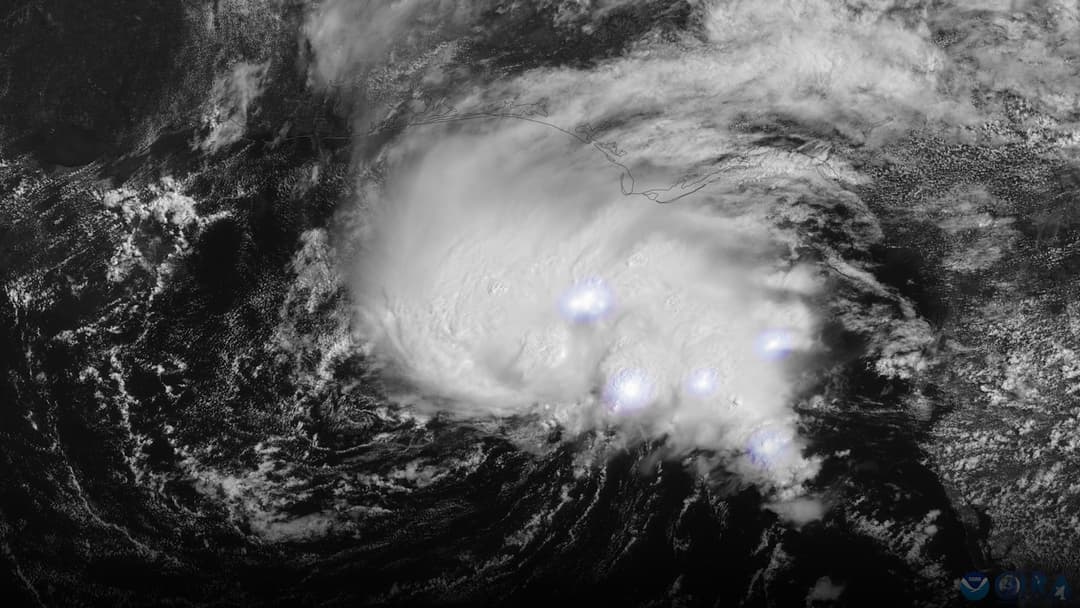 NOAA satellite capturing the early swirl and convective clouds of Hurricane Isaias.
