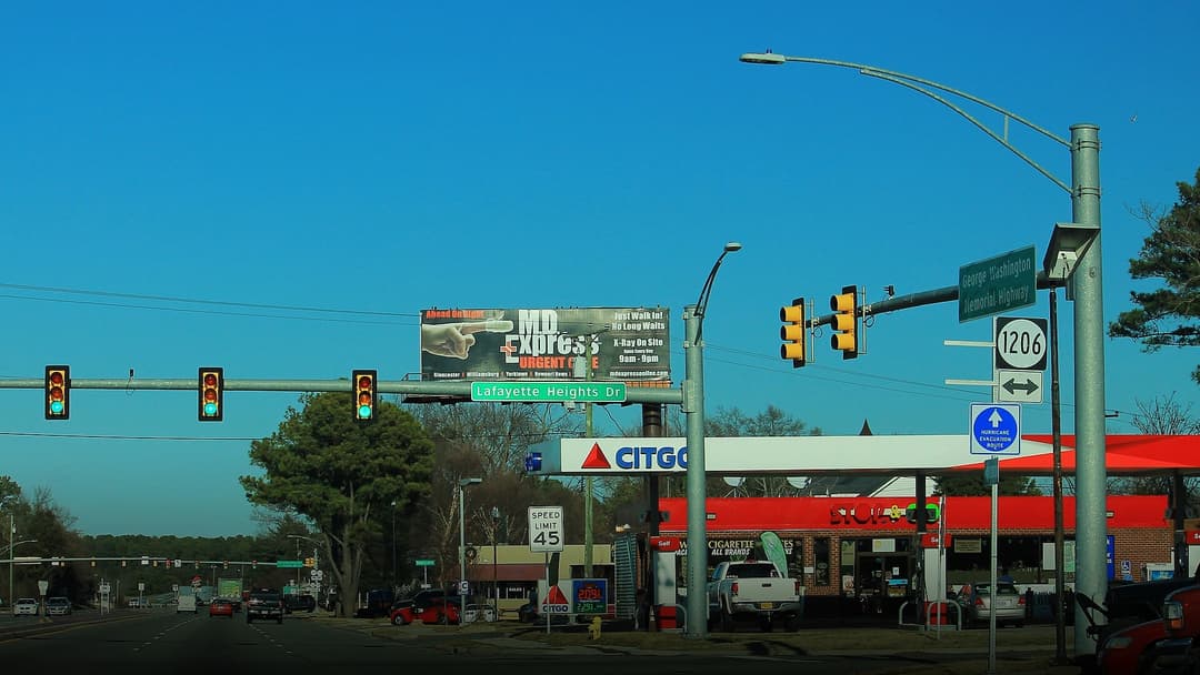 Vehicles moving along a designated hurricane evacuation route highway.