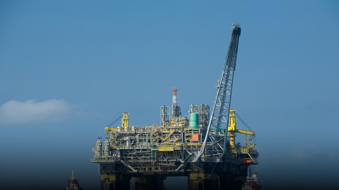 Massive offshore oil and gas production platform stationed in the Gulf of Mexico.