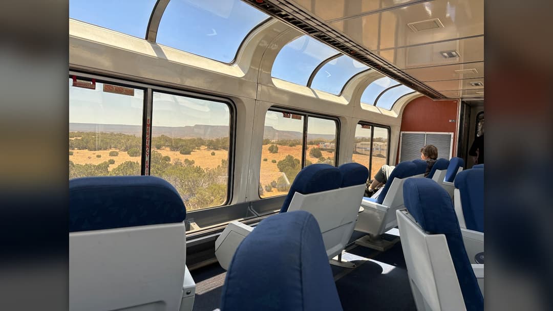 Amtrak's Southwest Chief rounding a curve through the high desert of Ribera, New Mexico.