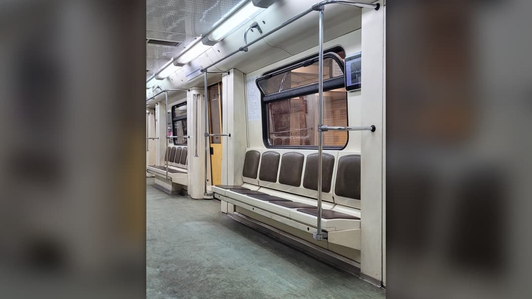Interior passenger seating cabin of a Moscow Metro train car