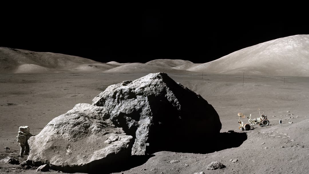 Wide panoramic view of the Moon's boulder-strewn lunar surface during Apollo 17