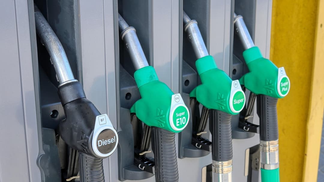 Diesel and gasoline fuel pump nozzles at a service station