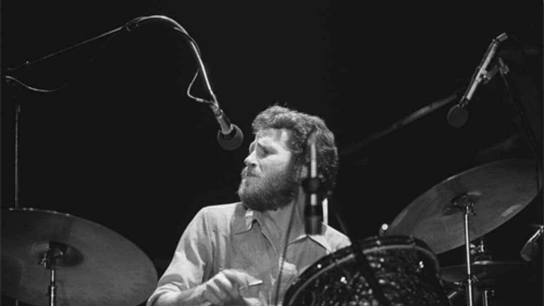 Levon Helm playing drums in 1976