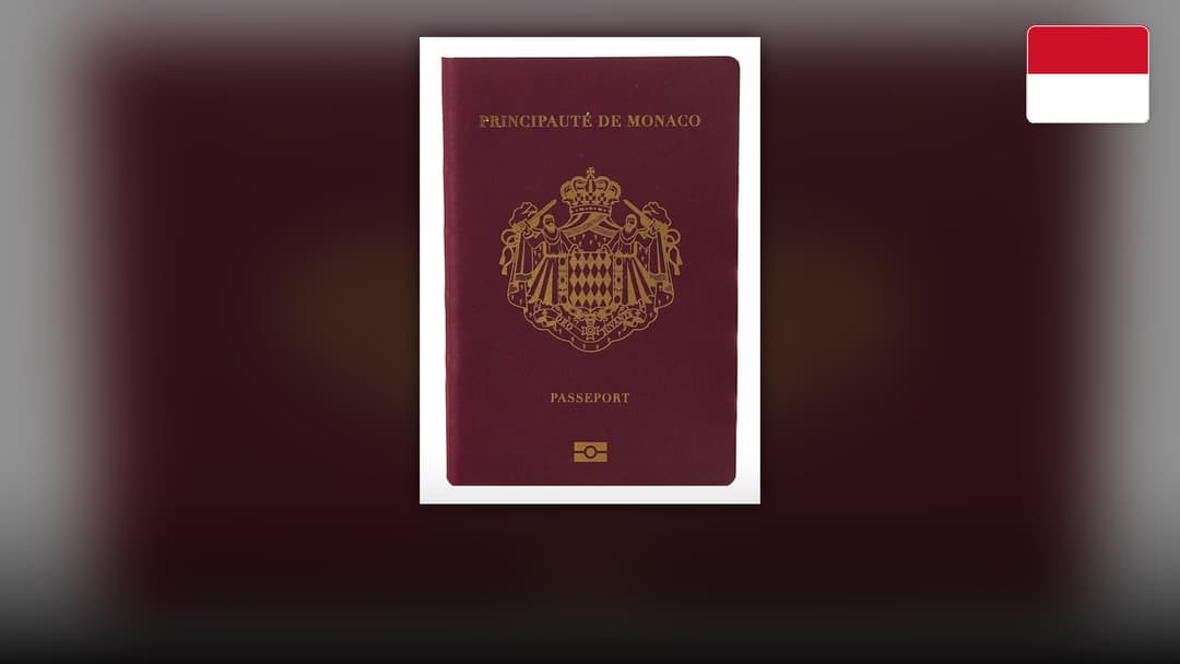 Burgundy passport cover of the Principality of Monaco with the Grimaldi coat of arms.