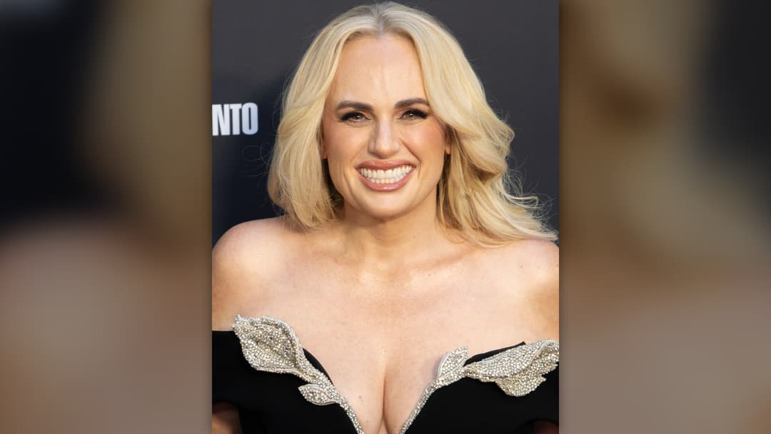 Australian actress Rebel Wilson smiling on the red carpet at the Toronto International Film Festival.
