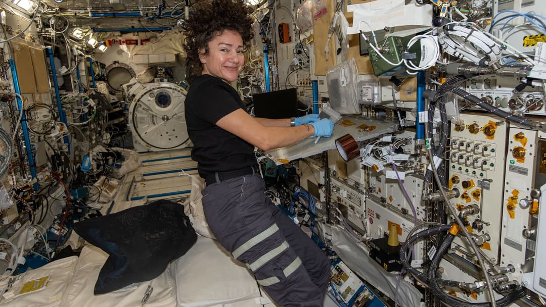 NASA astronaut Jessica Meir processing scientific samples inside the International Space Station laboratory
