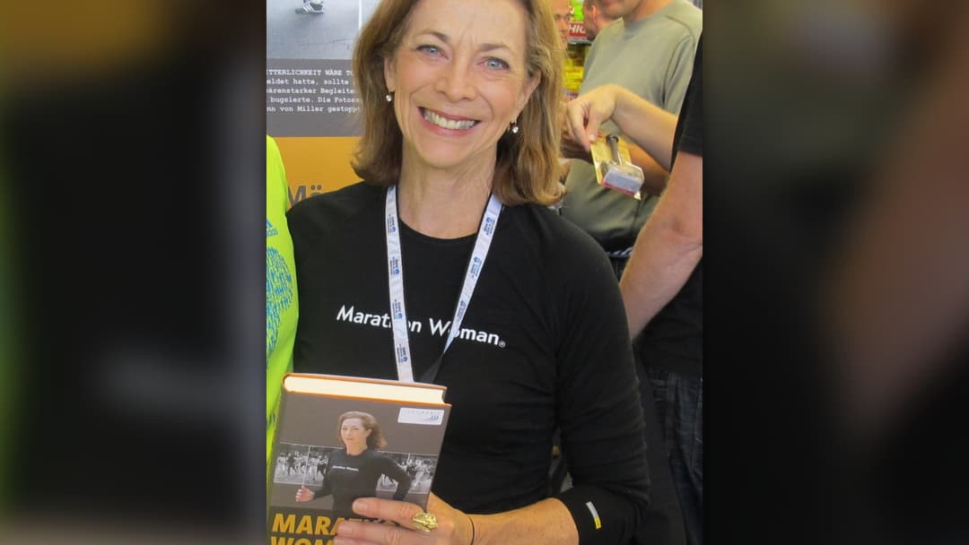 Marathon runner and author Kathrine Switzer smiling at an event