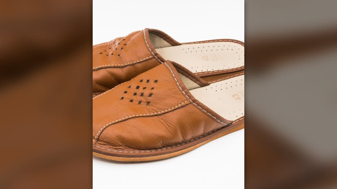 Pair of comfortable felt indoor house slippers