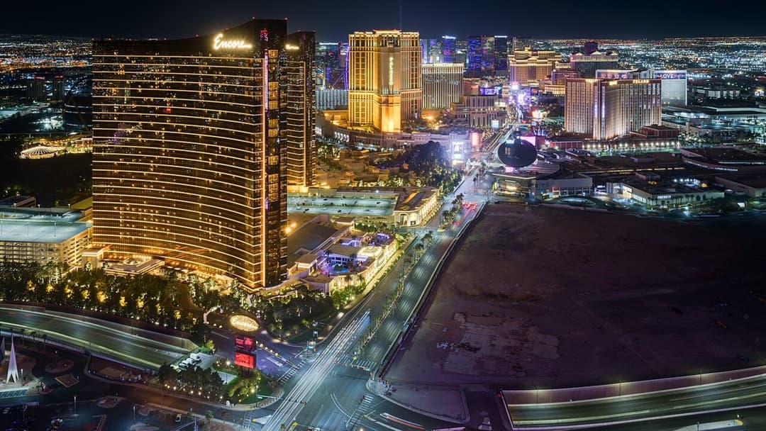 Illuminated Las Vegas Strip skyline at dusk.