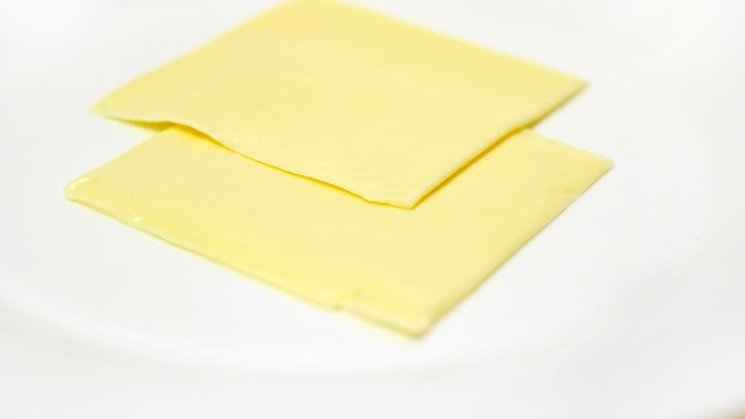 Packaged processed American cheese slices