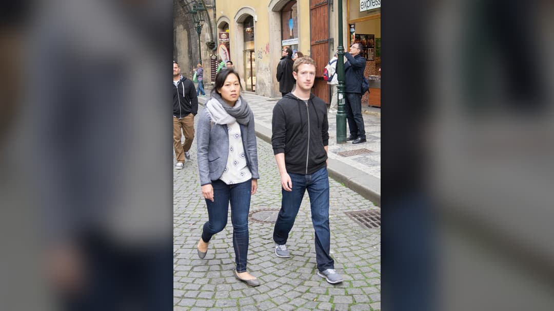 Meta CEO Mark Zuckerberg and his wife Priscilla Chan seated together at a formal ceremony in 2025