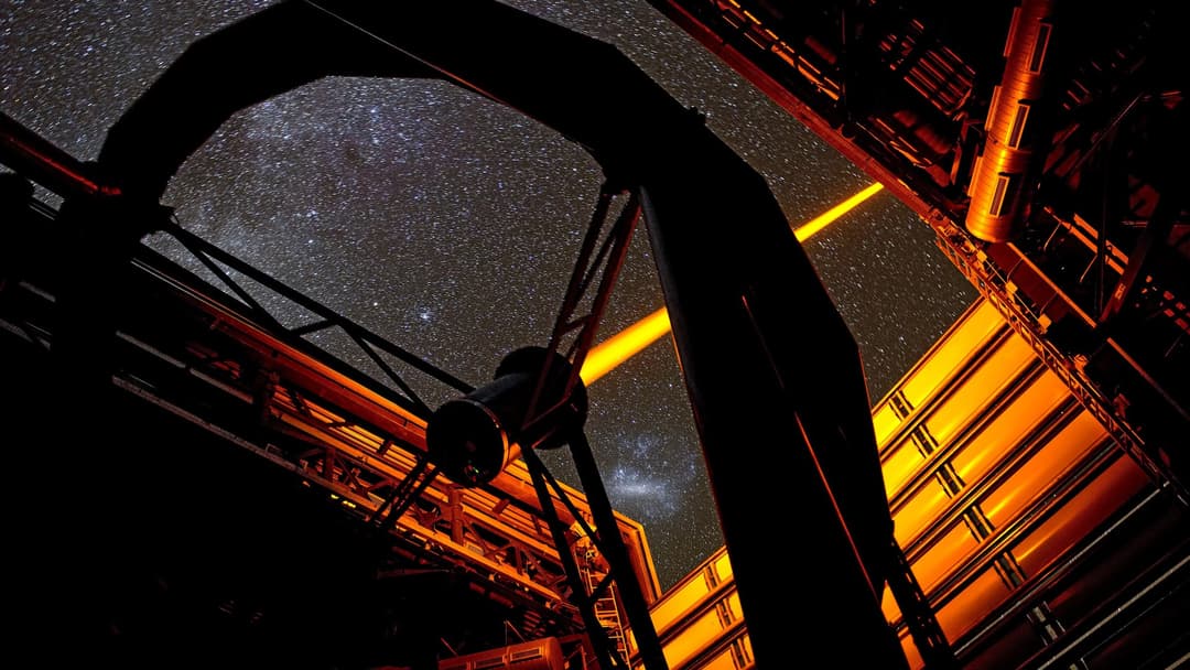 Laser guide star beam projecting from the Very Large Telescope at Paranal Observatory into the night sky