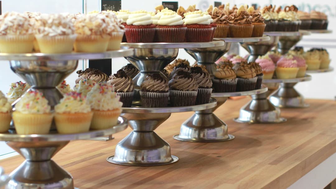 2. Revolving Dessert Displays Placed Right By The Exit