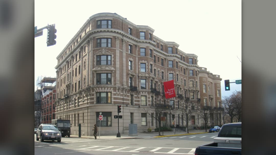 Exterior of Berklee College of Music building on Boylston Street in Boston with red banner