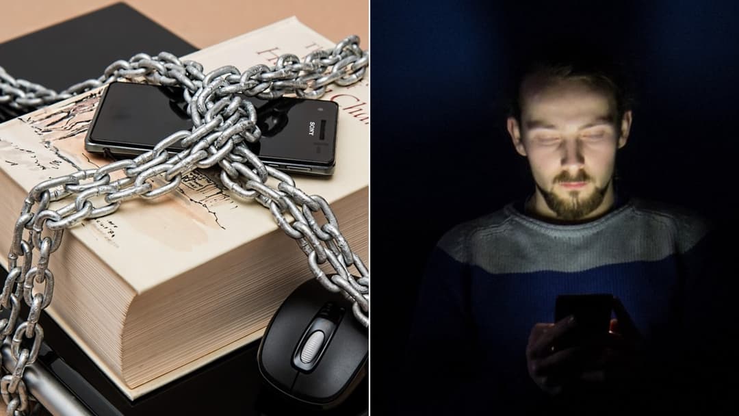 Smartphone resting on a desk with earphones plugged in