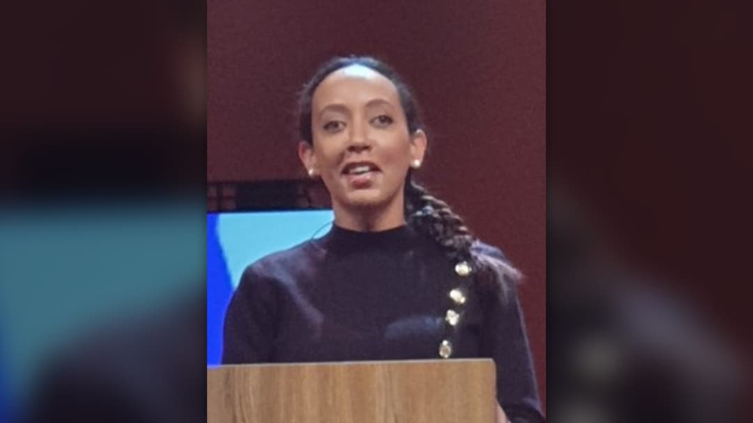Human rights advocate Haben Girma addressing an audience