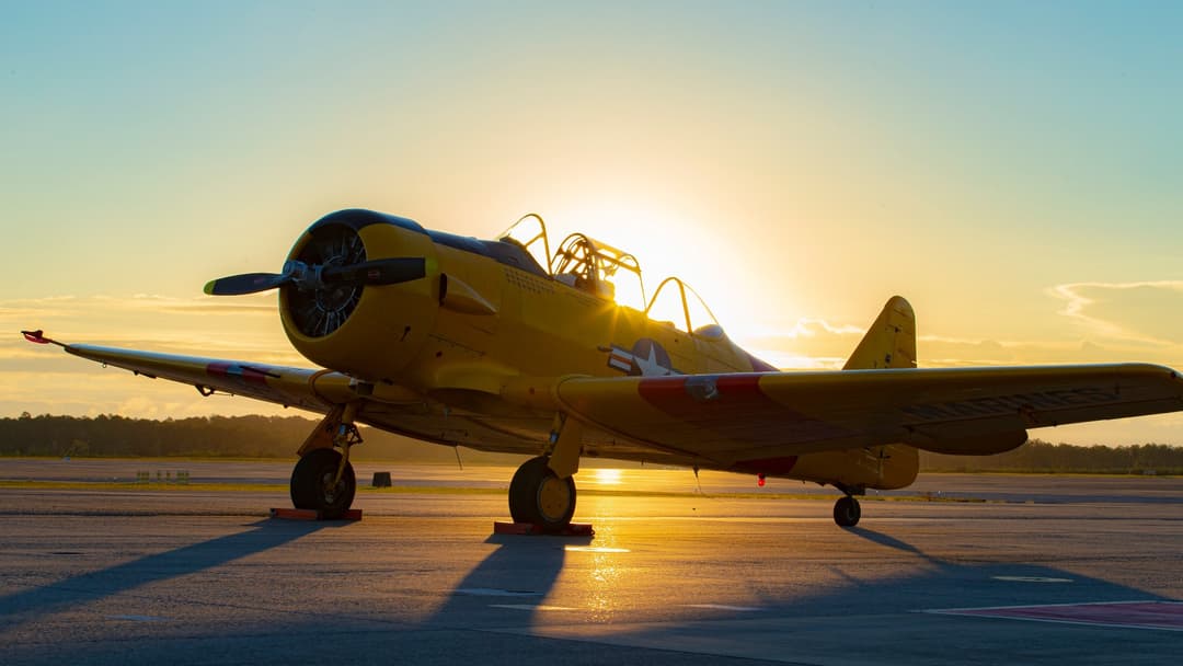 North American T-6 Texan WWII radial-engine trainer flying over Cape Canaveral Space Force Station