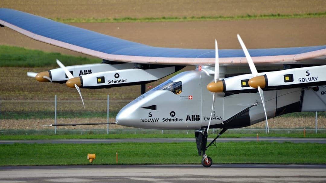 Solar Impulse 2 solar-powered aircraft taking off with wide solar-panel wingspan