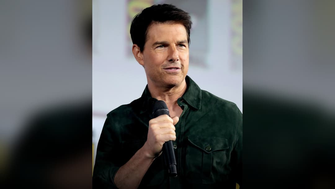 Tom Cruise looking sharp at a movie premiere.