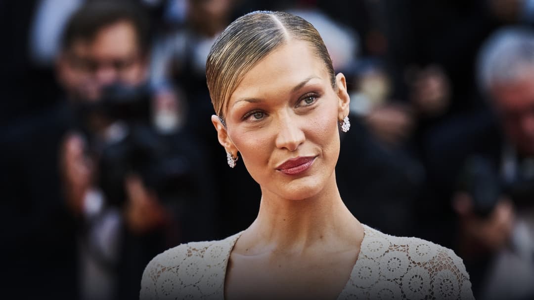 Bella Hadid posing in an elegant evening gown at the Cannes Film Festival