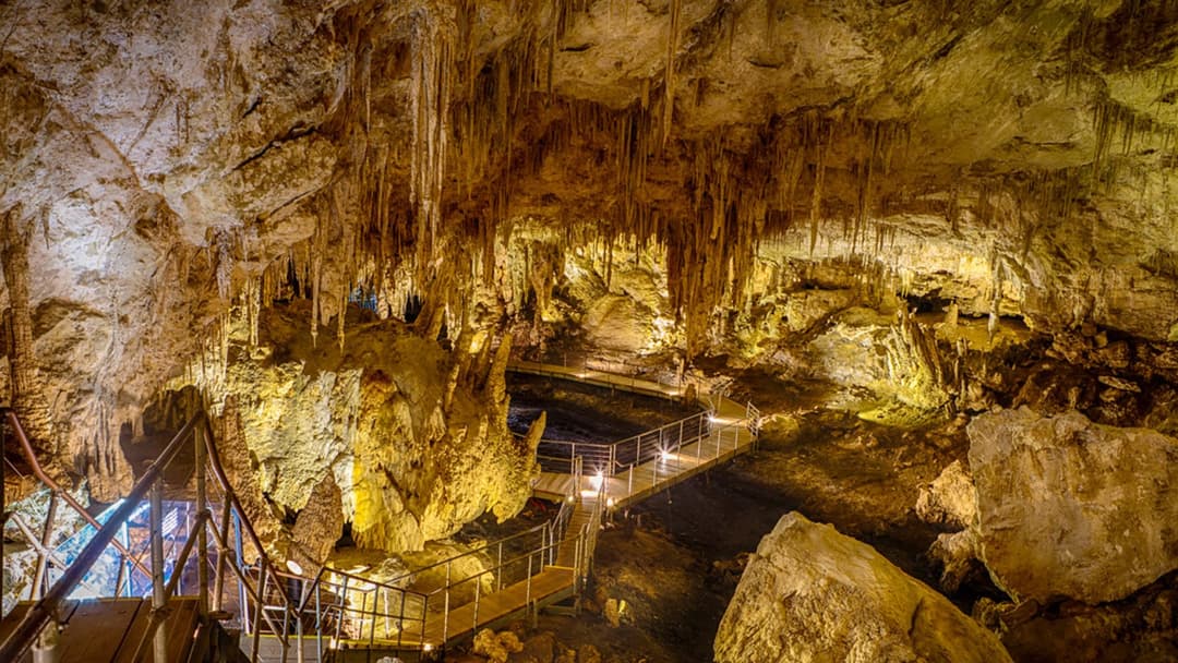 Mammoth Cave limestone chambers and illuminated pathways