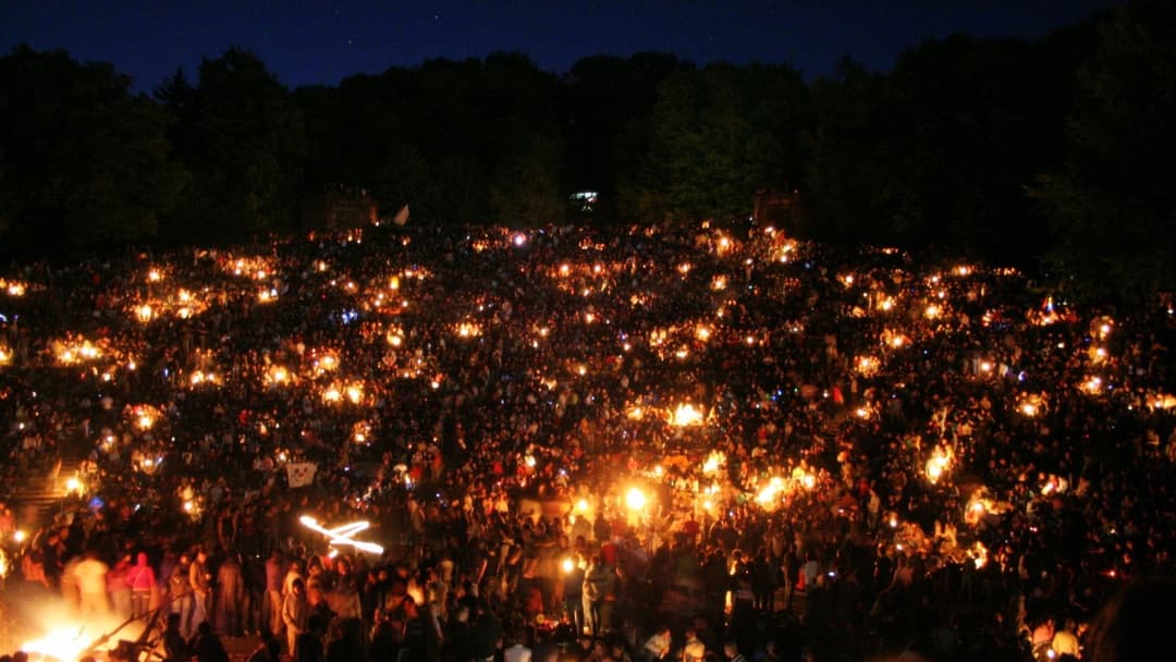 Huge nighttime bonfire glowing during Walpurgis Night celebrations