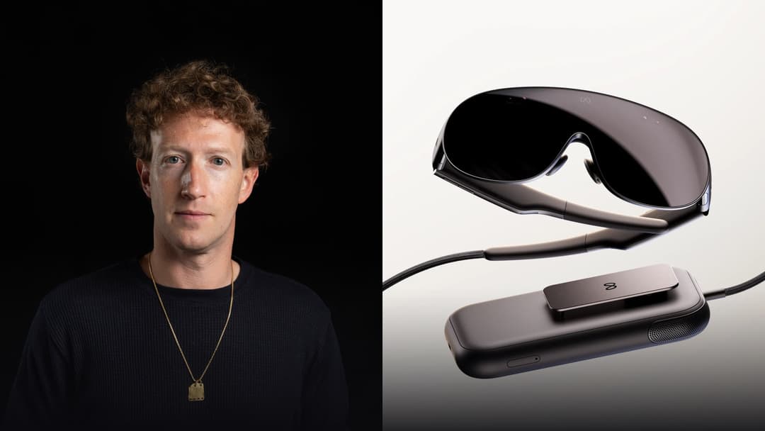 Sleek metallic Meta VR Glasses with curved visor resting above the pocket compute puck.