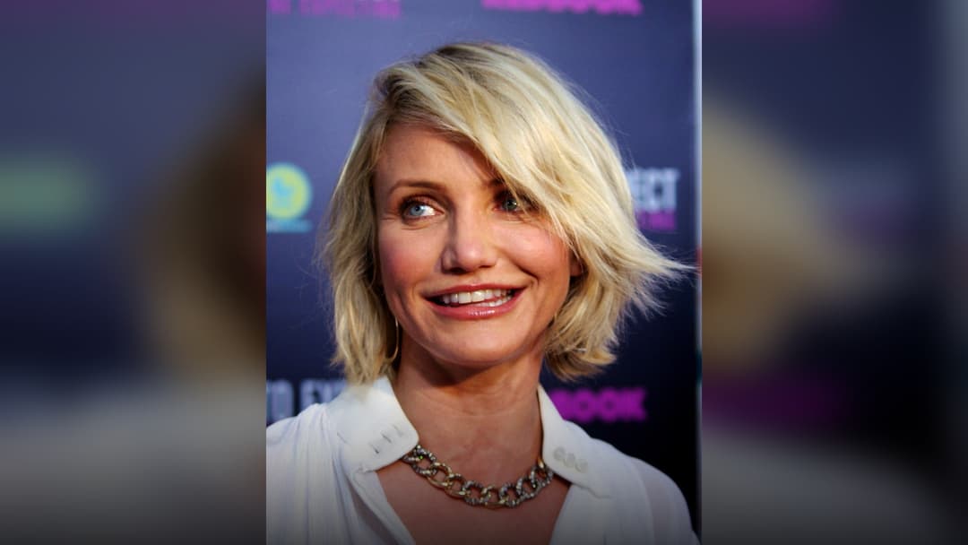 Actress Cameron Diaz smiling on the red carpet.